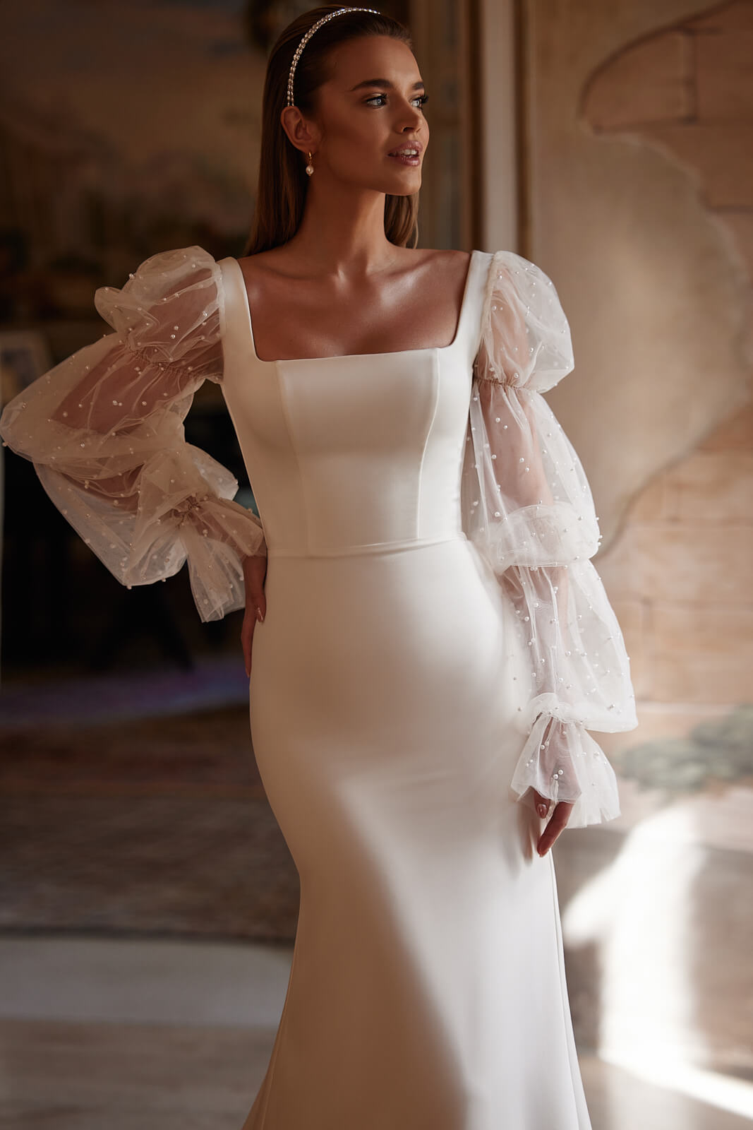 Robe de mariée sirène Clara à manches longues, DAMA Couture.